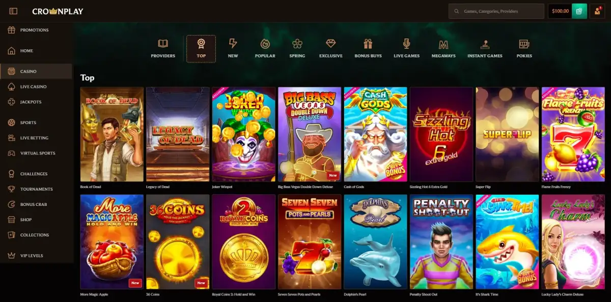 CrownPlay casino lobby in the Top filter showing Book of Dead and Legacy of Dead (Play'n GO), Big Bass Vegas Double Down Deluxe (Pragmatic Play), Sizzling Hot 6 Extra Gold and Lucky Lady's Charm Deluxe (Greentube), Royal Coins 2 Hold and Win (Playson), plus Joker Winpot, Cash of Gods, Super Flip, Flame Fruits Frenzy, Dolphin's Pearl and Penalty Shoot Out. Filter tabs include Bonus Buys, Megaways and Pokies. Captured July 2026.